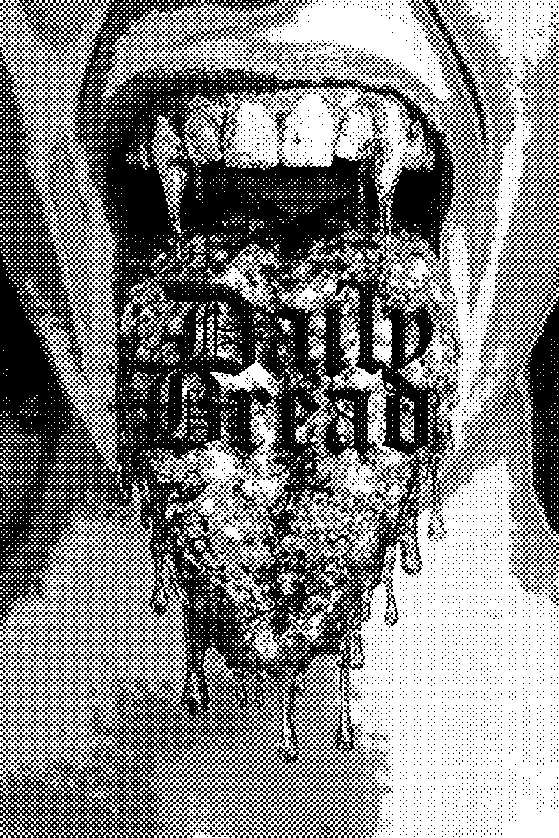 Daily Bread №1 cover — an open mouth with dripping teeth over a jewelled tongue, blackletter wordmark overlaid